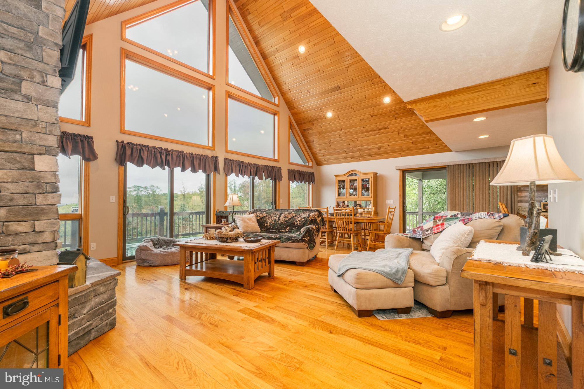 1875 Pysell Crosscut Road Oakland, MD 21550 - Photo 29 of 67 a living room with furniture and a large window
