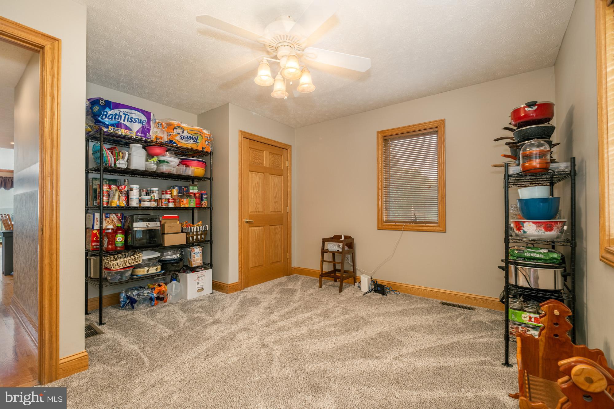 1875 Pysell Crosscut Road Oakland, MD 21550 - Photo 63 of 67 a view of a workspace with furniture and toys
