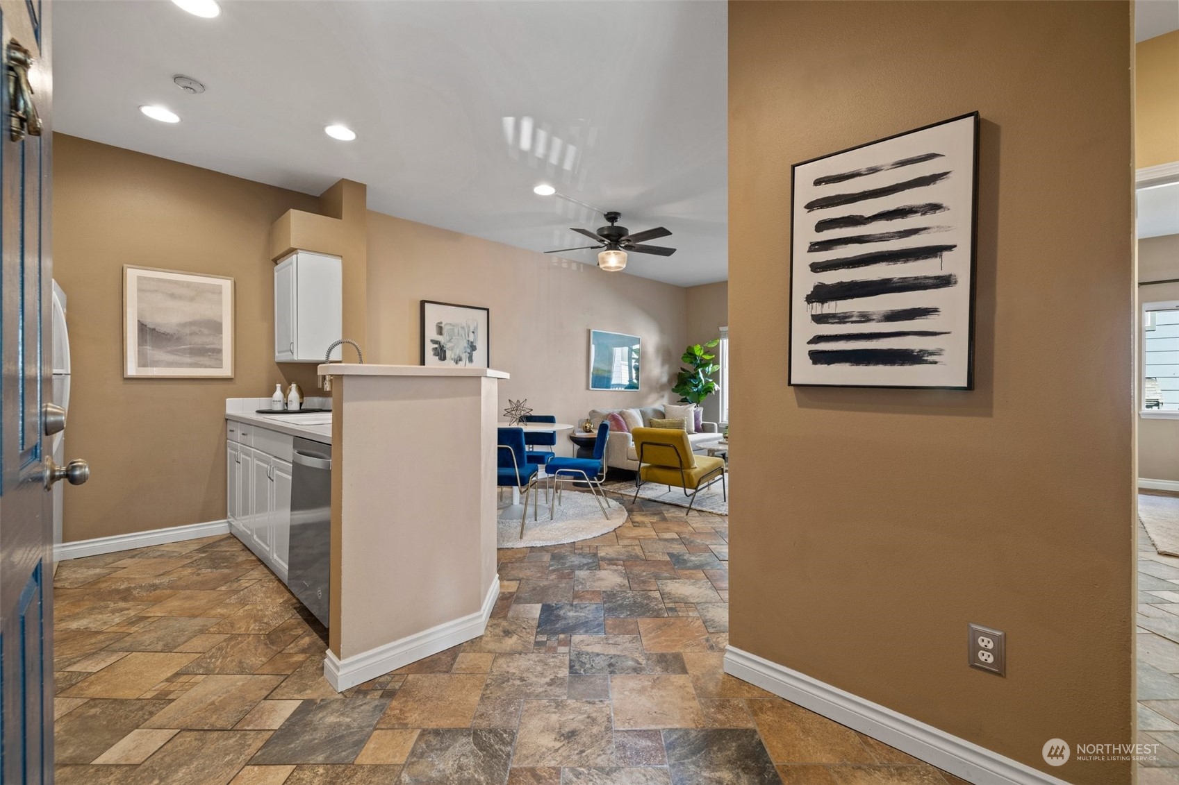 23908 Bothell Everett Highway, Unit B203 Bothell, WA 98021 - Photo 3 of 15 a view of a kitchen with furniture and wooden floor