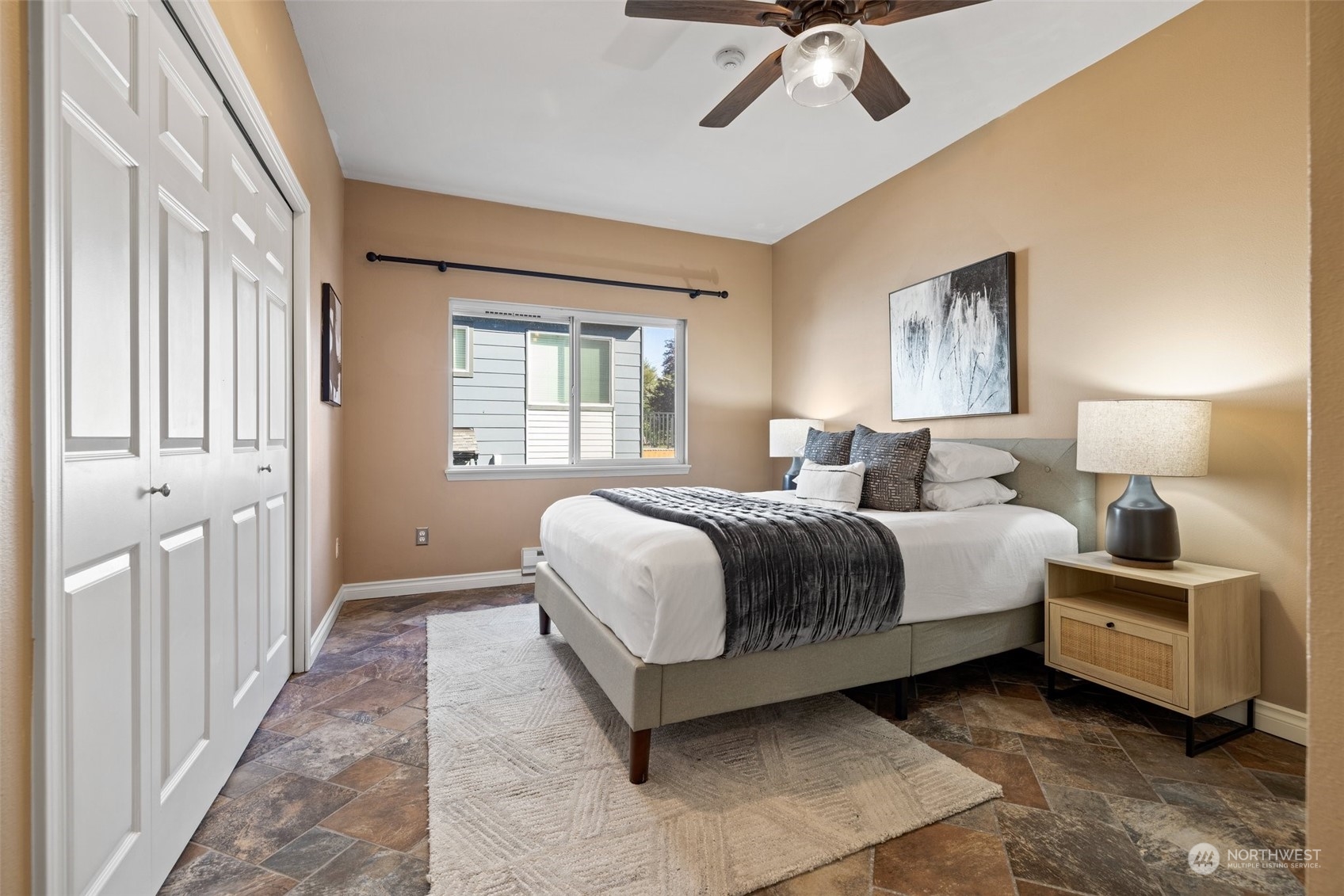 23908 Bothell Everett Highway, Unit B203 Bothell, WA 98021 - Photo 10 of 15 a spacious bedroom with a bed and window