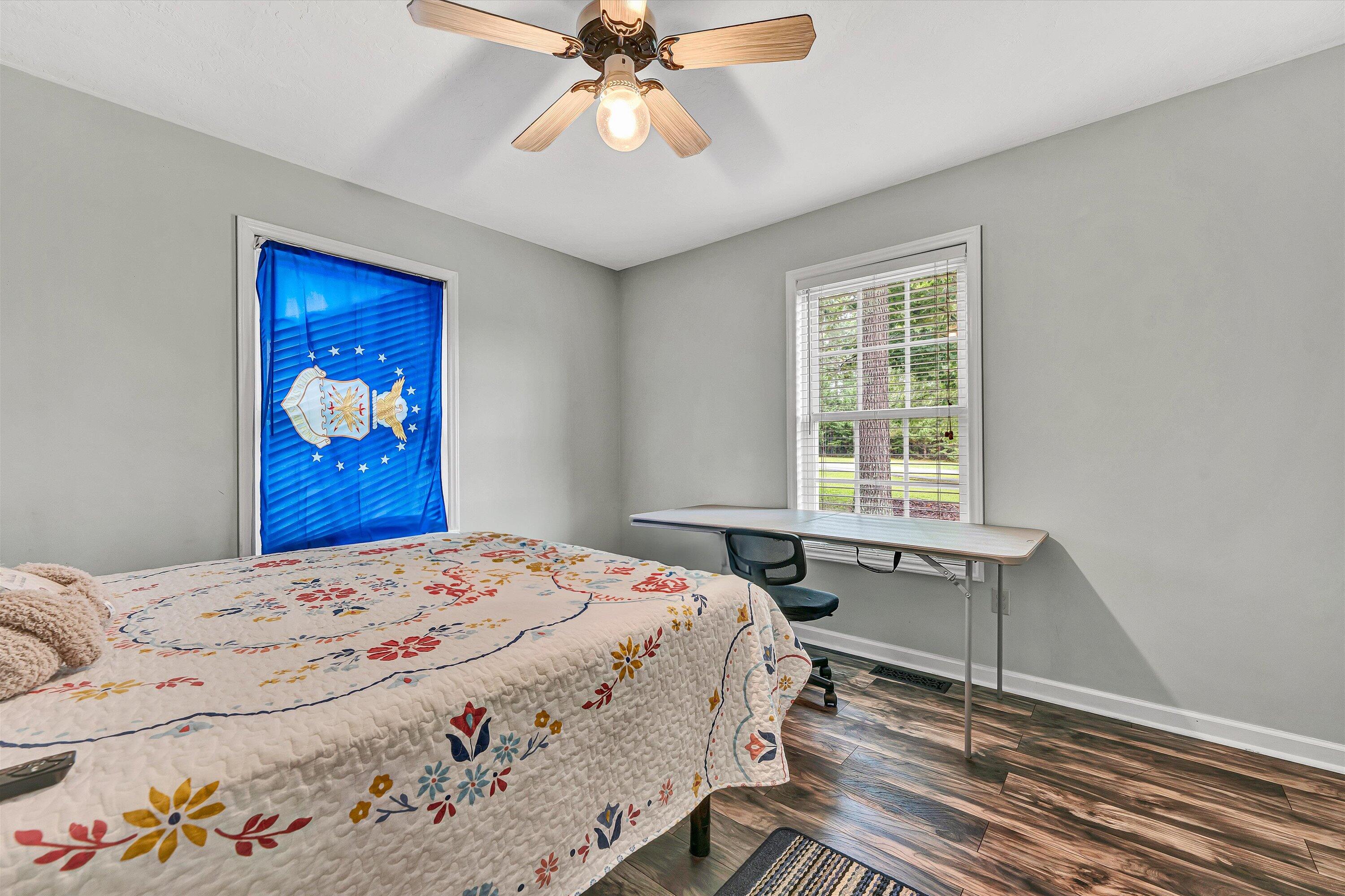 5935 Scruggs Road Moneta, VA 24121 - Photo 19 of 37 a bedroom with a bed and a window