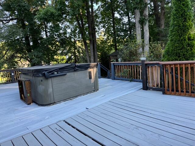 5935 Scruggs Road Moneta, VA 24121 - Photo 21 of 37 a view of deck with wooden floor and fence