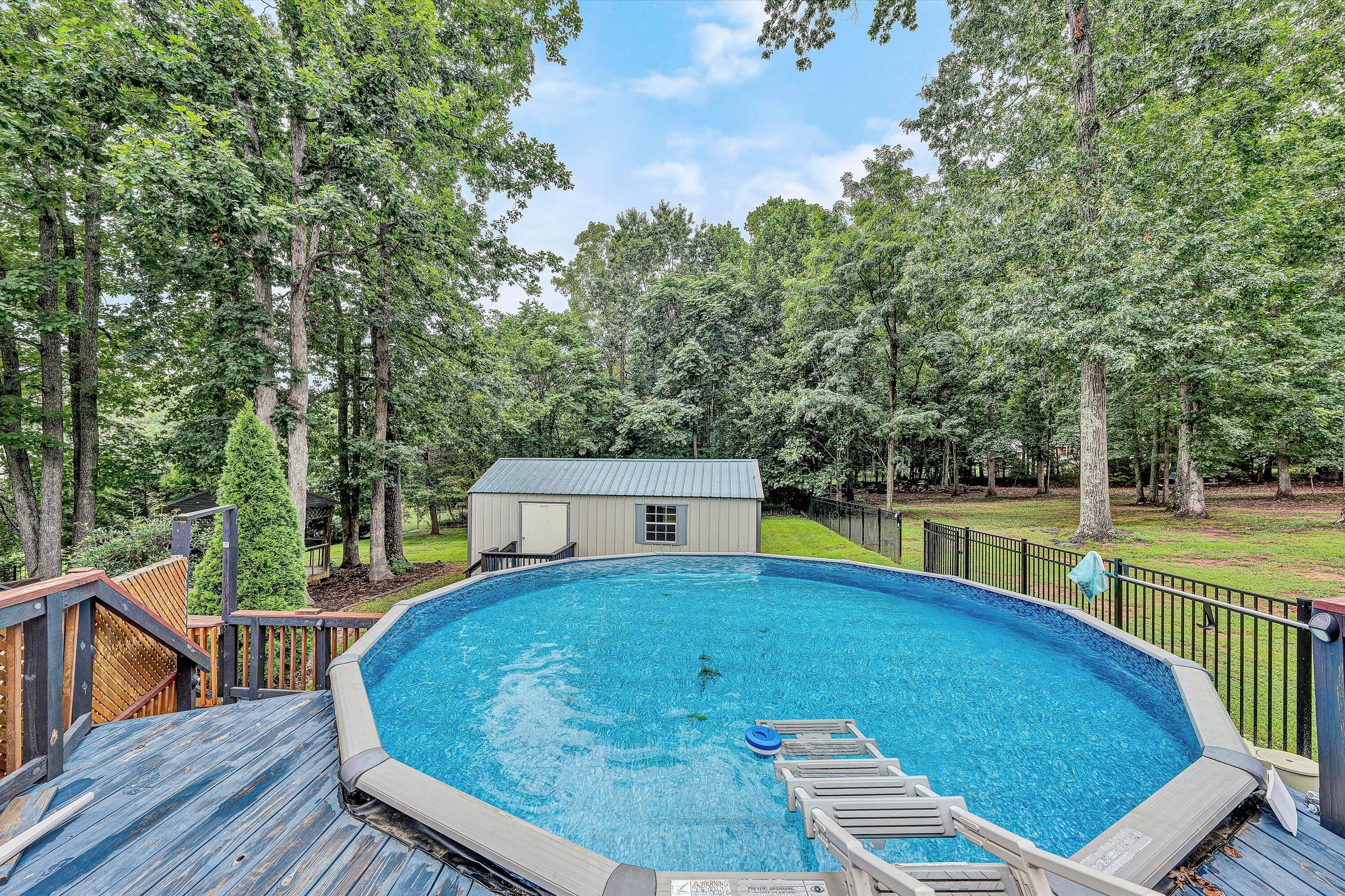 5935 Scruggs Road Moneta, VA 24121 - Photo 28 of 37 swimming pool view with a outdoor seating