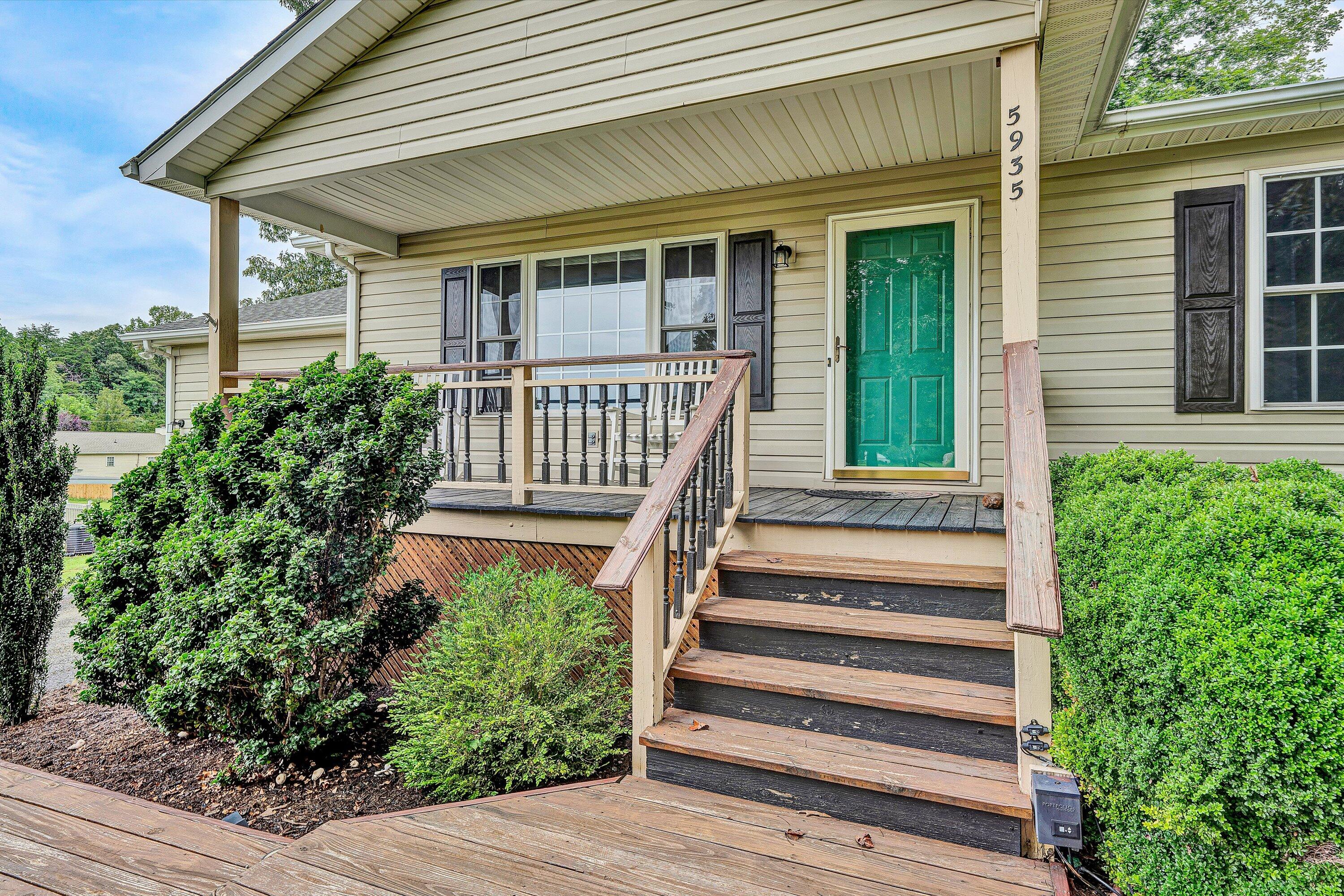 5935 Scruggs Road Moneta, VA 24121 - Photo 4 of 37 a front view of a house with a porch