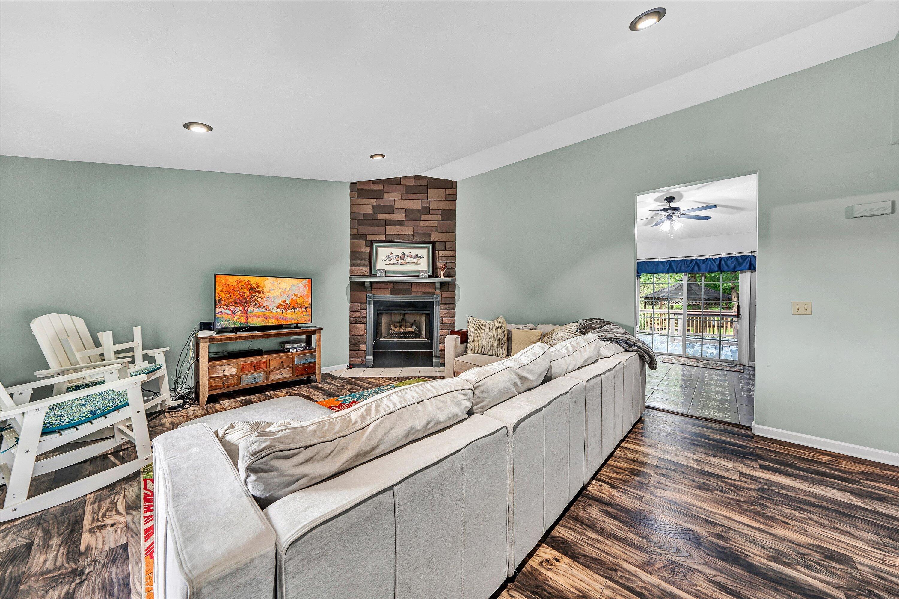 5935 Scruggs Road Moneta, VA 24121 - Photo 7 of 37 a living room with furniture and a flat screen tv