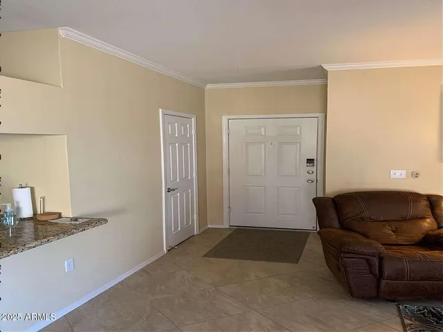 a view of livingroom with furniture and cabinet