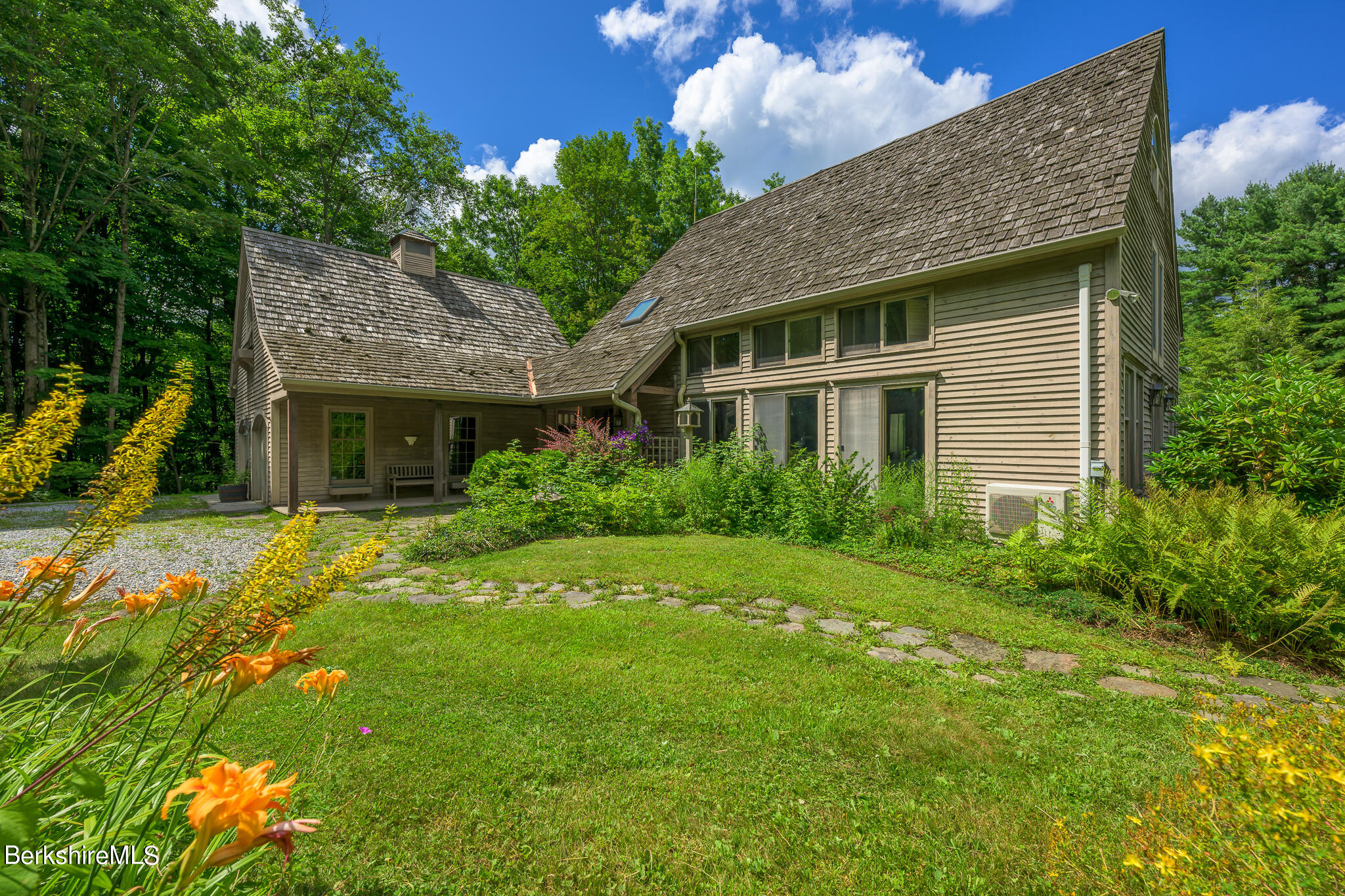 248 Osceola Notch Road Lenox, MA 01254 - Photo 3 of 43 a view of a house with a backyard