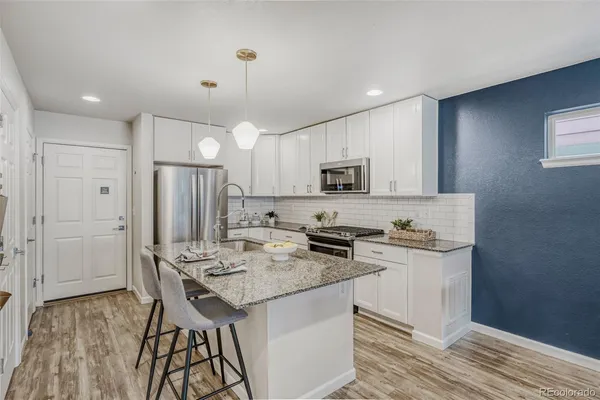 $565,000 | 5869 Boston Street, Denver, CO 80238