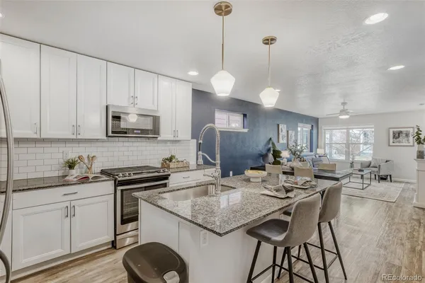 $565,000 | 5869 Boston Street, Denver, CO 80238