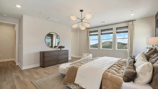 a bathroom with a bathtub shower sink double and mirror