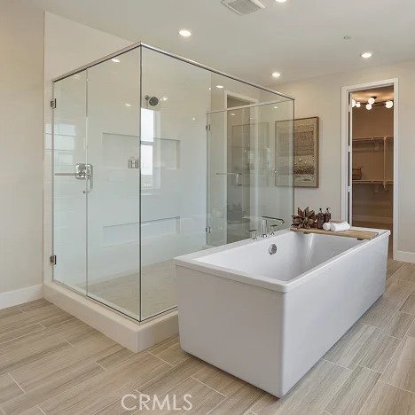 24328 Calle La Roca Valencia, CA 91354 - Photo 15 of 41 a spacious bathroom with a shower and a sink