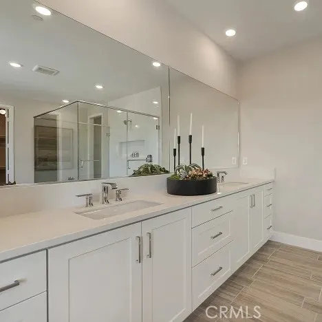 a kitchen with refrigerator and window