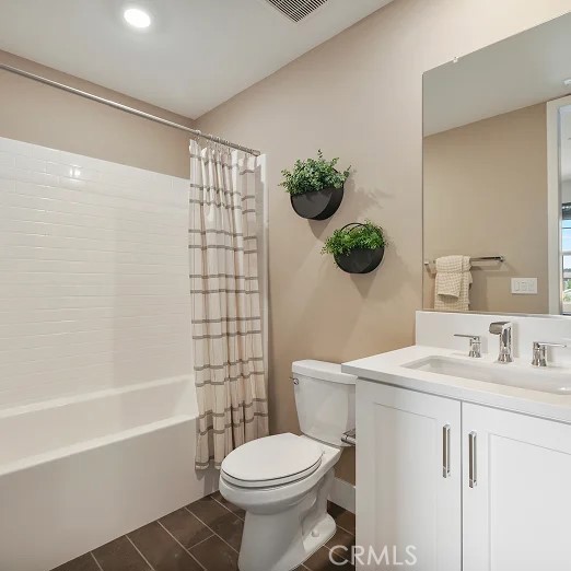 24328 Calle La Roca Valencia, CA 91354 - Photo 23 of 41 a bathroom with a sink toilet and shower