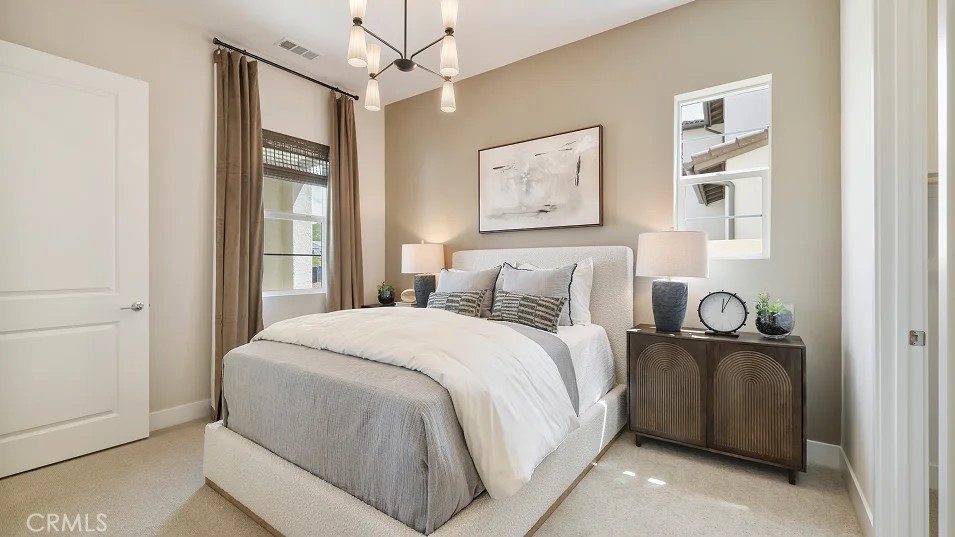 24328 Calle La Roca Valencia, CA 91354 - Photo 25 of 41 a bedroom with bed and window