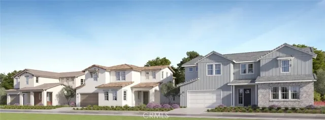 a view of a patio with a table and chairs under an umbrella