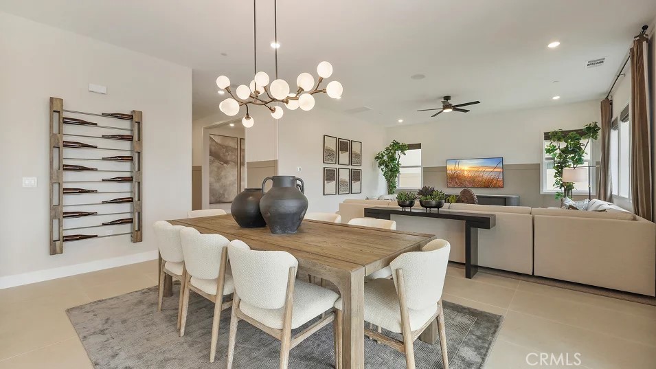 24328 Calle La Roca Valencia, CA 91354 - Photo 7 of 41 a view of a dining room with furniture and chandelier