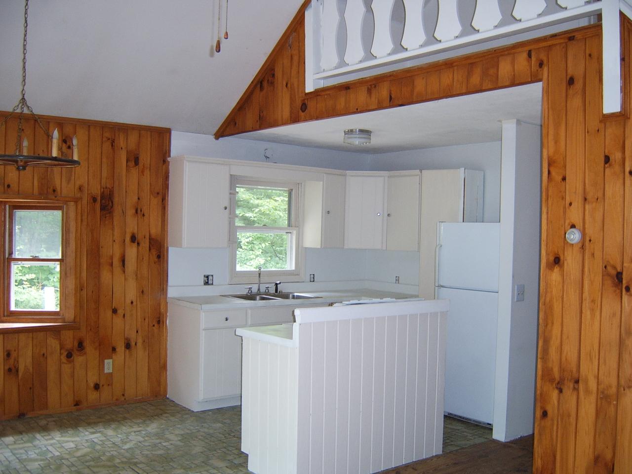 141 Plumb Road Becket, MA 01223 - Photo 6 of 10 a view of a kitchen with a sink and dishwasher