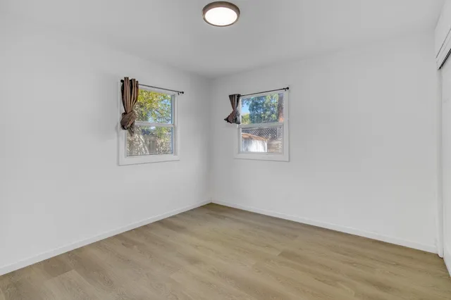 a view of a backyard with a garden