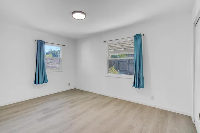 a view of empty room with empty shelves