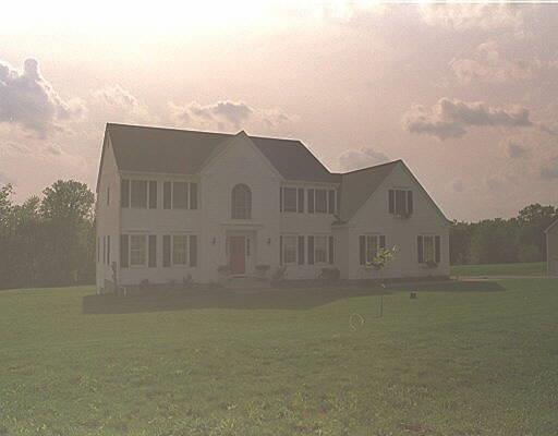 33 Charter Ridge Drive Newtown, CT 06482 - Photo 1 of 1 a front view of a house with a yard