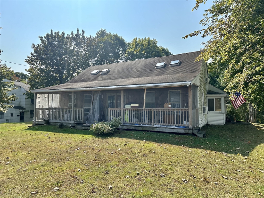 1271 Main Street Leicester, MA 01524 - Photo 2 of 23 a view of a house with a yard and a large tree