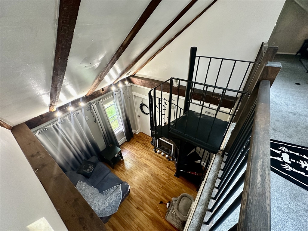 1271 Main Street Leicester, MA 01524 - Photo 22 of 23 a view of an entryway and livingroom with wooden floor