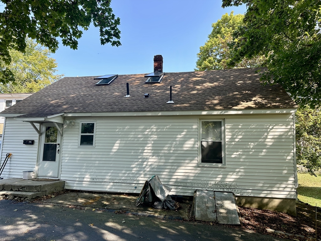 1271 Main Street Leicester, MA 01524 - Photo 4 of 23 a view of a house with a yard