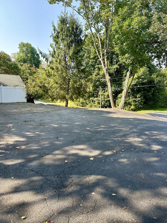 1271 Main Street Leicester, MA 01524 - Photo 7 of 23 a view of a yard with a tree