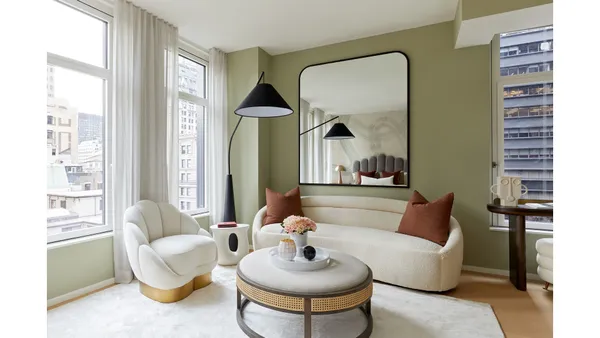 a bed room with a bed and a large window