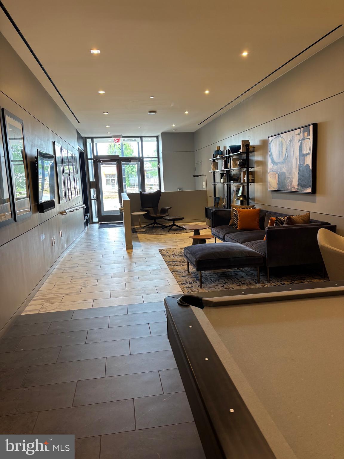 1211 Van Street Southeast, Unit 310 Washington, DC 20003 - Photo 25 of 49 a lobby with furniture and window