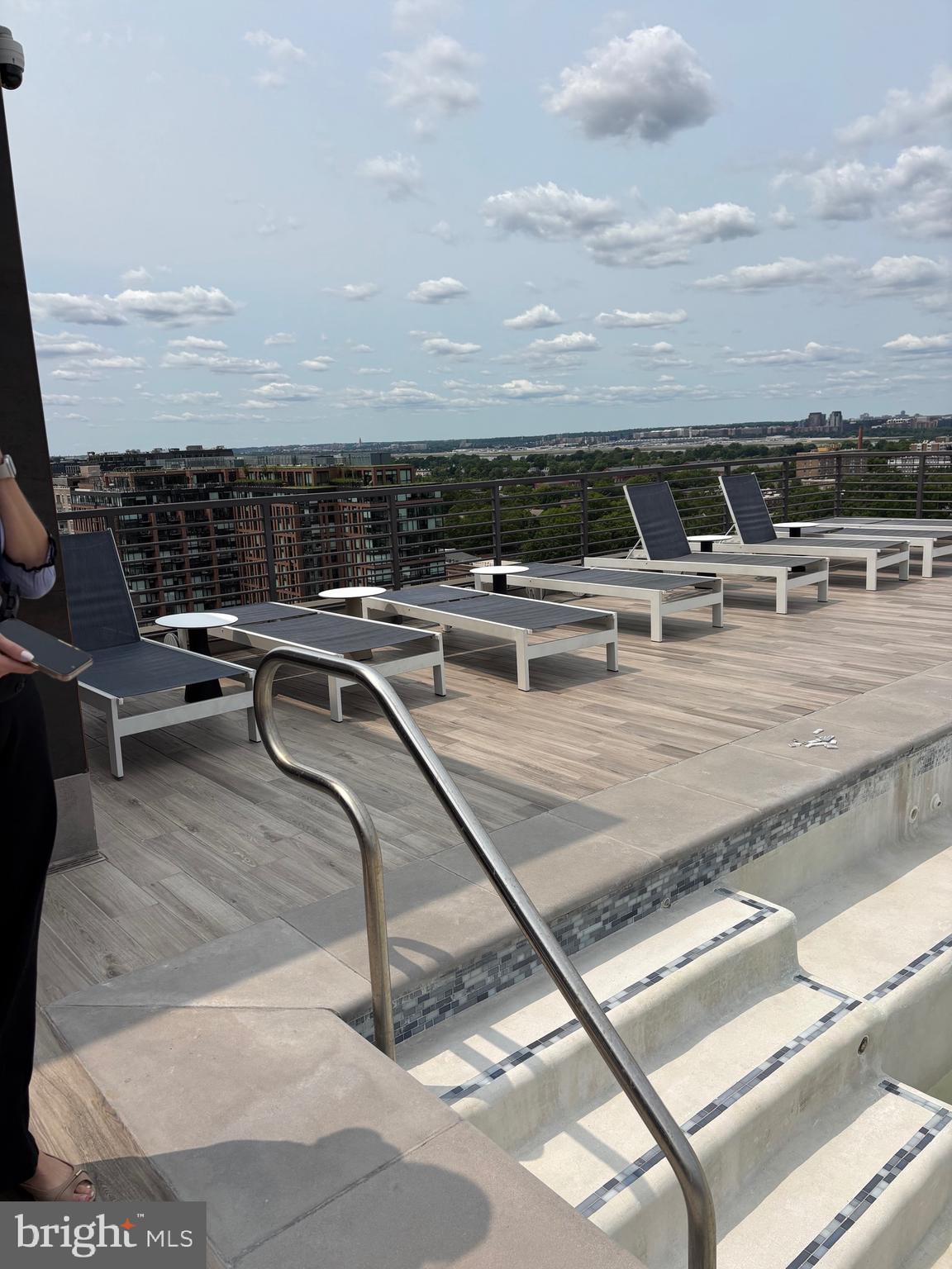 1211 Van Street Southeast, Unit 310 Washington, DC 20003 - Photo 42 of 49 a view of a terrace with furniture