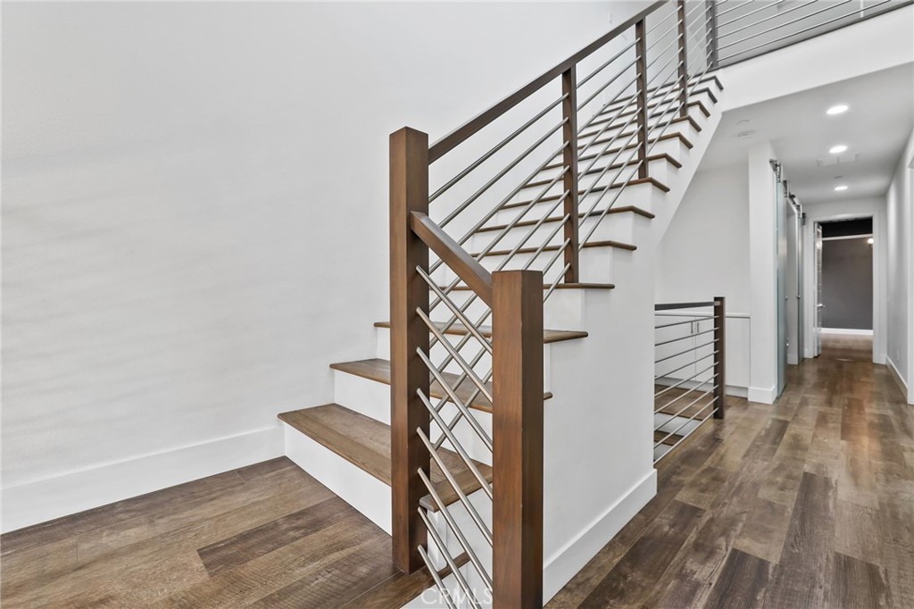 51 Prominence Lake Forest, CA 92630 - Photo 31 of 60 a view of entryway with stairs and wooden floor