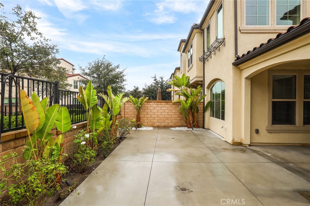 51 Prominence Lake Forest, CA 92630 - Photo 49 of 60 a view of a path along with potted plants