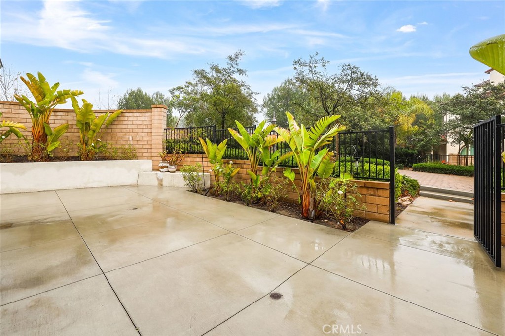 51 Prominence Lake Forest, CA 92630 - Photo 50 of 60 a view of a pathway with a bench in front of building