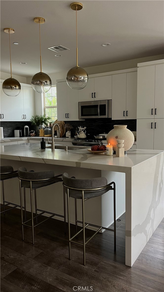 51 Prominence Lake Forest, CA 92630 - Photo 60 of 60 a kitchen with a sink cabinets and window