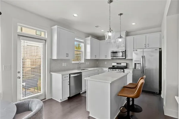a bathroom with a toilet and sink