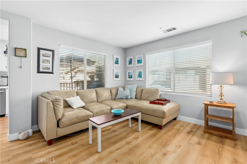 59 Red Bud Aliso Viejo, CA 92656 - Photo 12 of 34 a living room with furniture and a large window