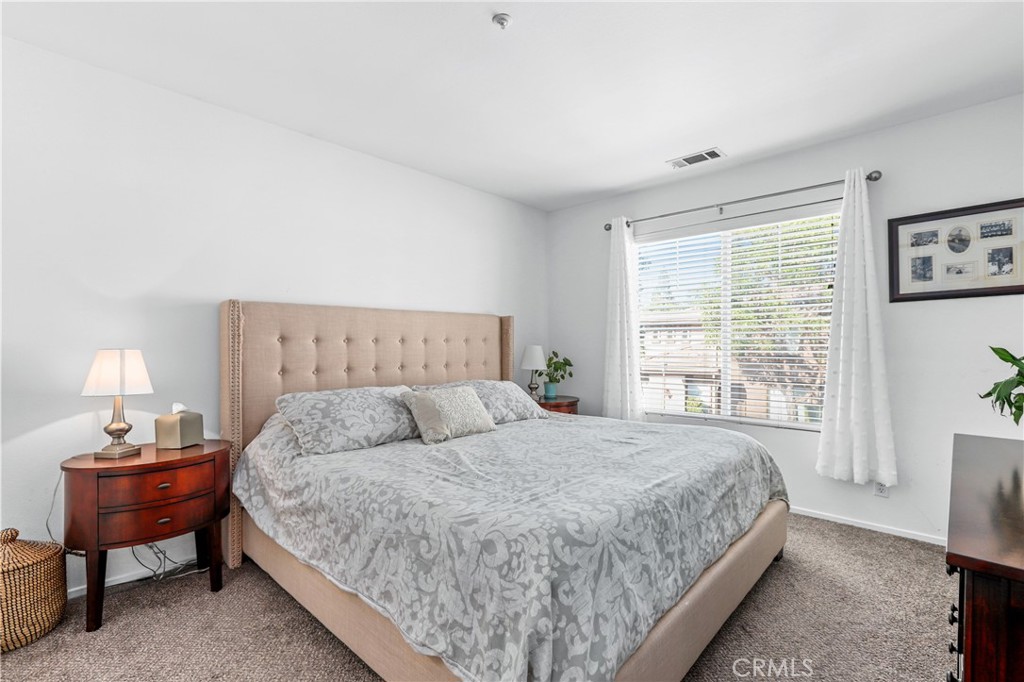 59 Red Bud Aliso Viejo, CA 92656 - Photo 23 of 34 a bedroom with a bed and a window