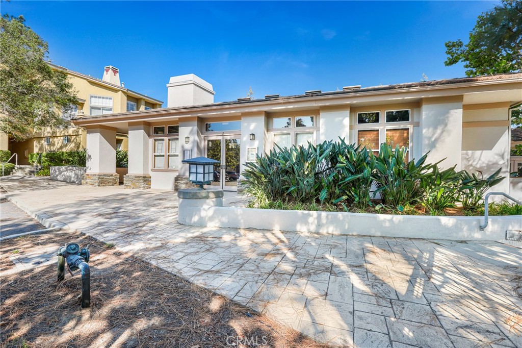 59 Red Bud Aliso Viejo, CA 92656 - Photo 32 of 34 a view of a white house with a outdoor space