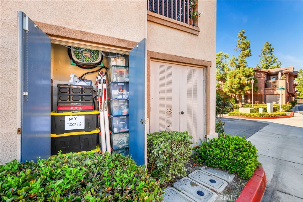 59 Red Bud Aliso Viejo, CA 92656 - Photo 4 of 34 a sign board with flower plants