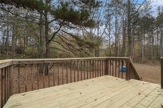 a view of balcony and wooden floor
