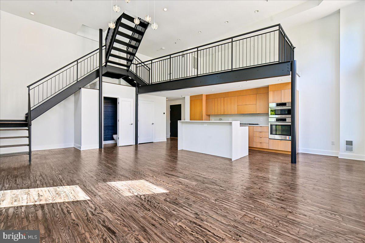 1111 W Street Northwest, Unit 12 Washington, DC 20009 - Photo 14 of 50 a view of entryway and hall with wooden floor