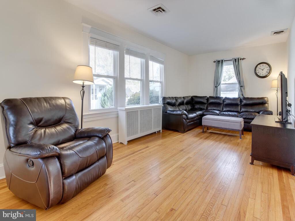115 Sycamore Road Linthicum, MD 21090 - Photo 4 of 49 Gleaming wood flooring greets you at the entrance.