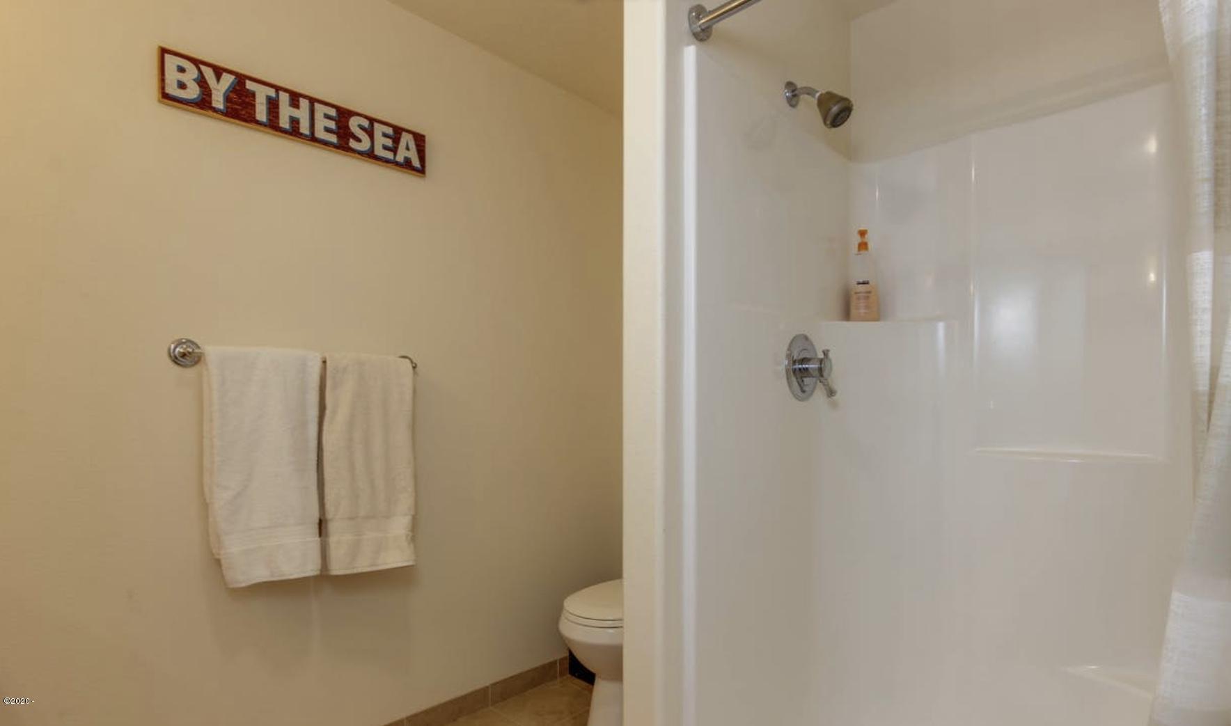 5777 Logan Road Lincoln City, OR 97367 - Photo 22 of 30 Guest Bathroom Upstairs