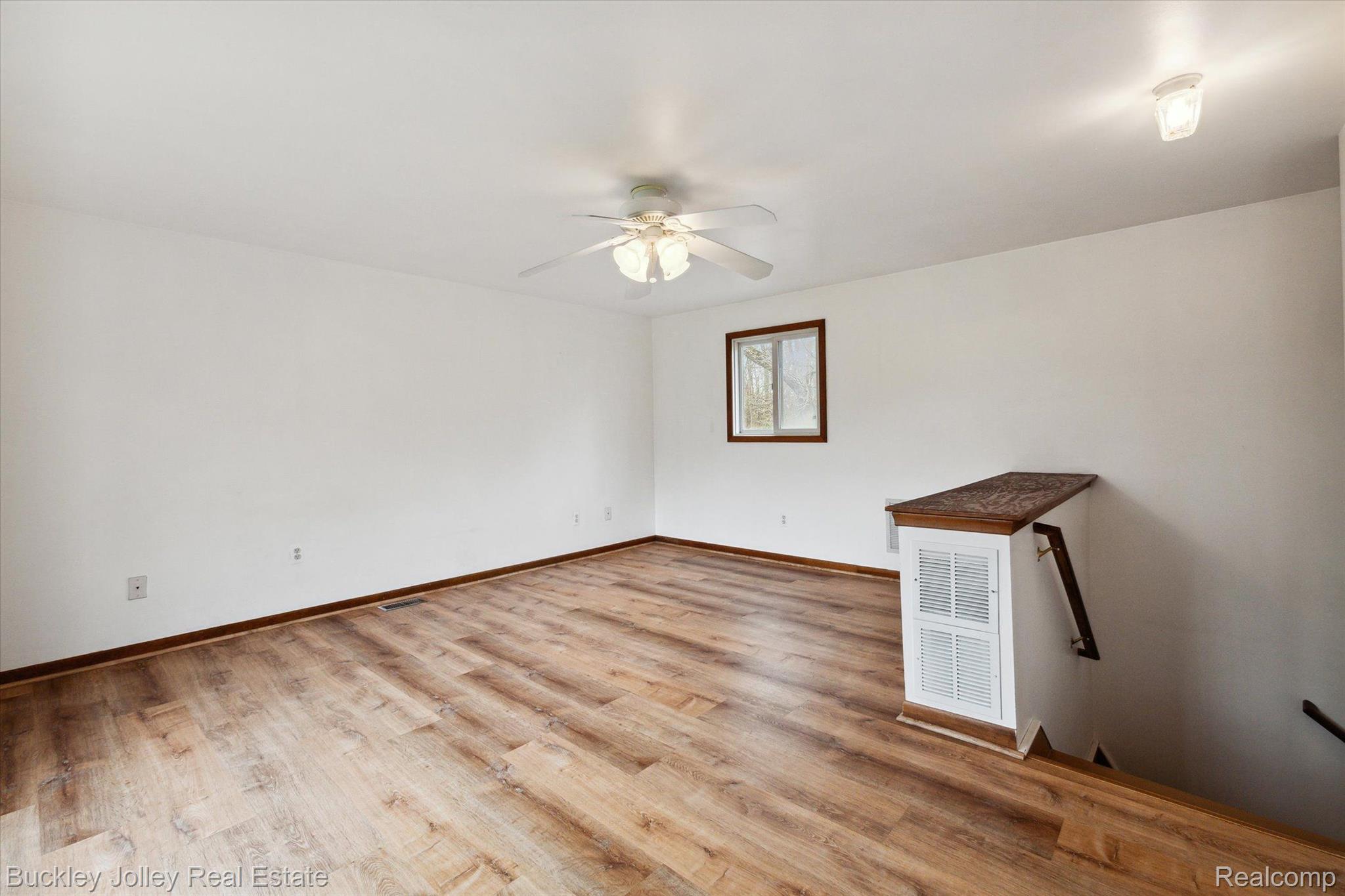 2075 Corlett Road Brighton, MI 48114 - Photo 10 of 28 Primary has Laminate Flooring
