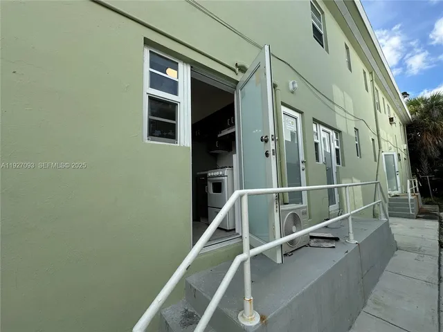 a kitchen with a sink stove and refrigerator