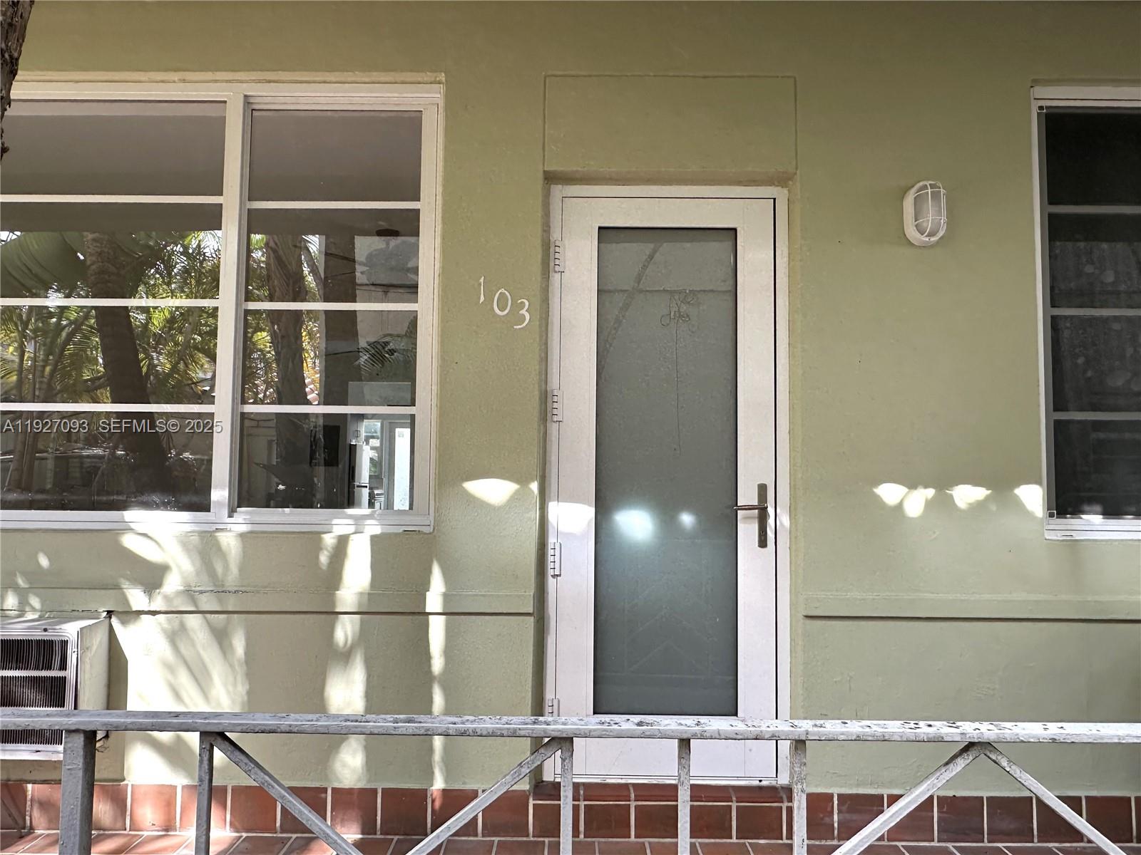 1540 Euclid Avenue, Unit 103 Miami Beach, FL 33139 - Photo 2 of 22 a bathroom with a sink and a mirror