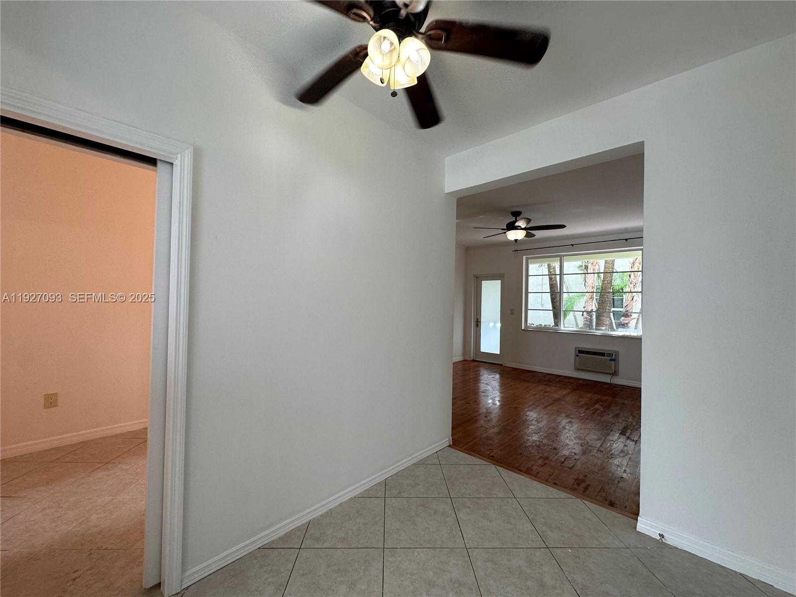 1540 Euclid Avenue, Unit 103 Miami Beach, FL 33139 - Photo 9 of 22 a view of empty room with window