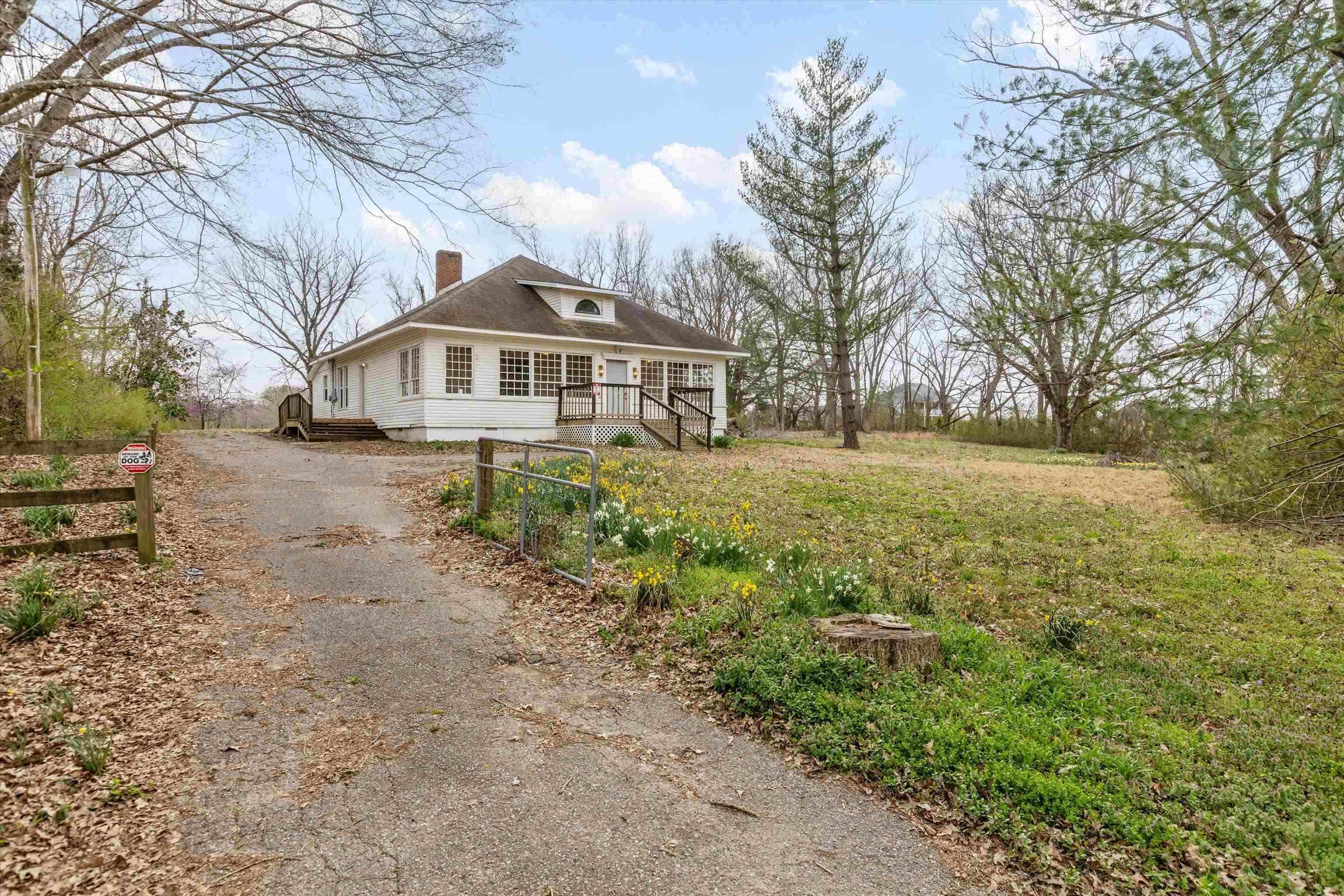 8457 East Kerrville Rosemark Road Millington, TN 38053 - Photo 1 of 32 Bungalow-style home featuring a chimney and driveway