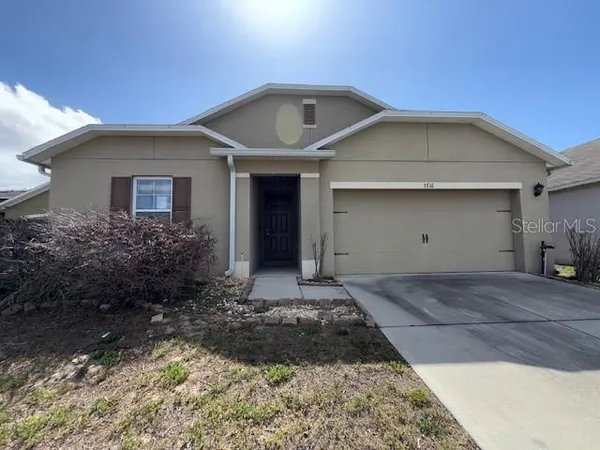 a front view of house with yard